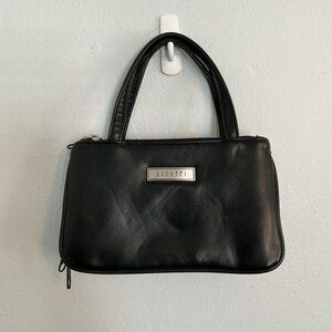 Rosetti Woman’s Small Black Handbag.